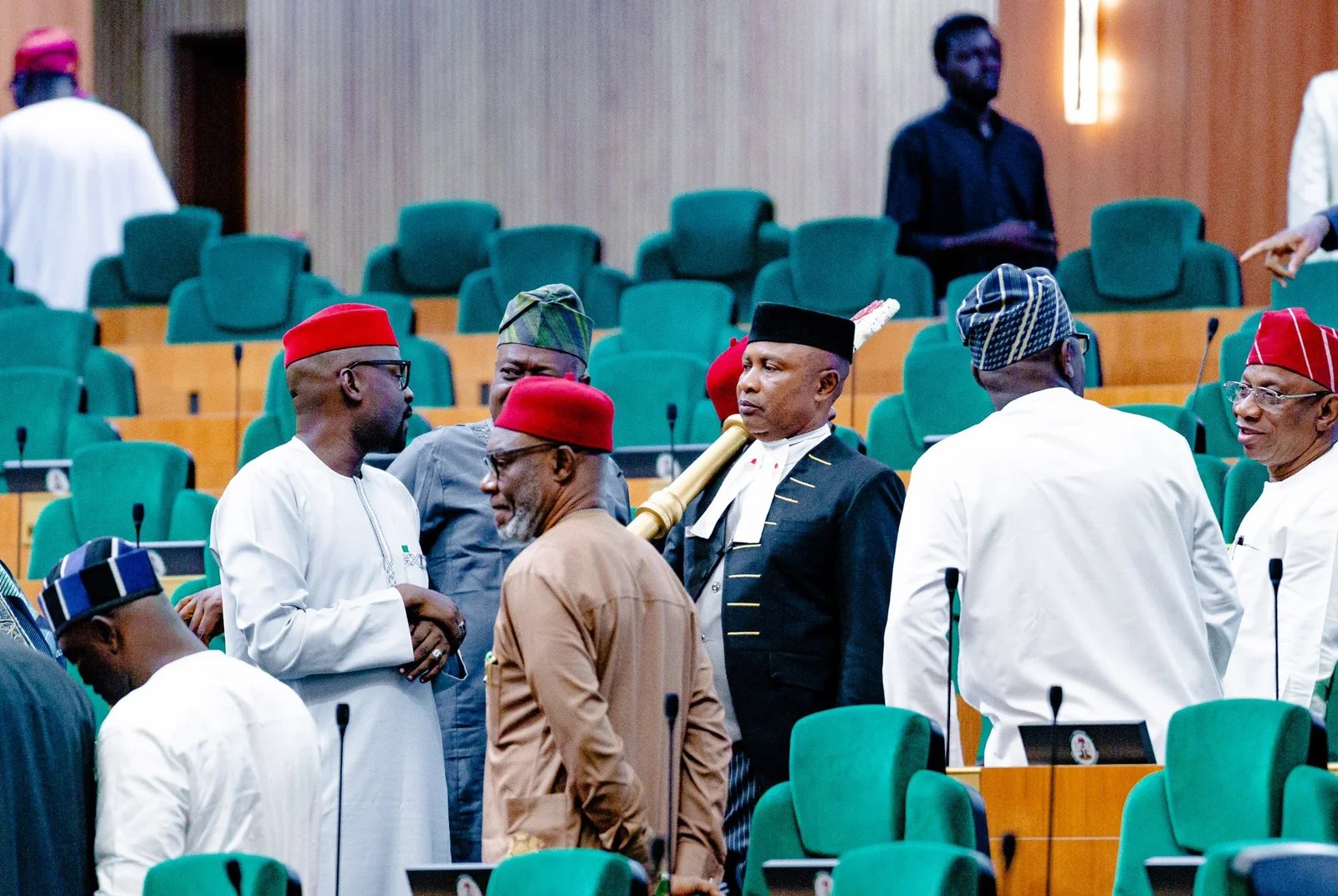 Nigerian Politicians At A Political Gathering Illustrating The Growing Trend Of Party Defections Ahead Of Elections.