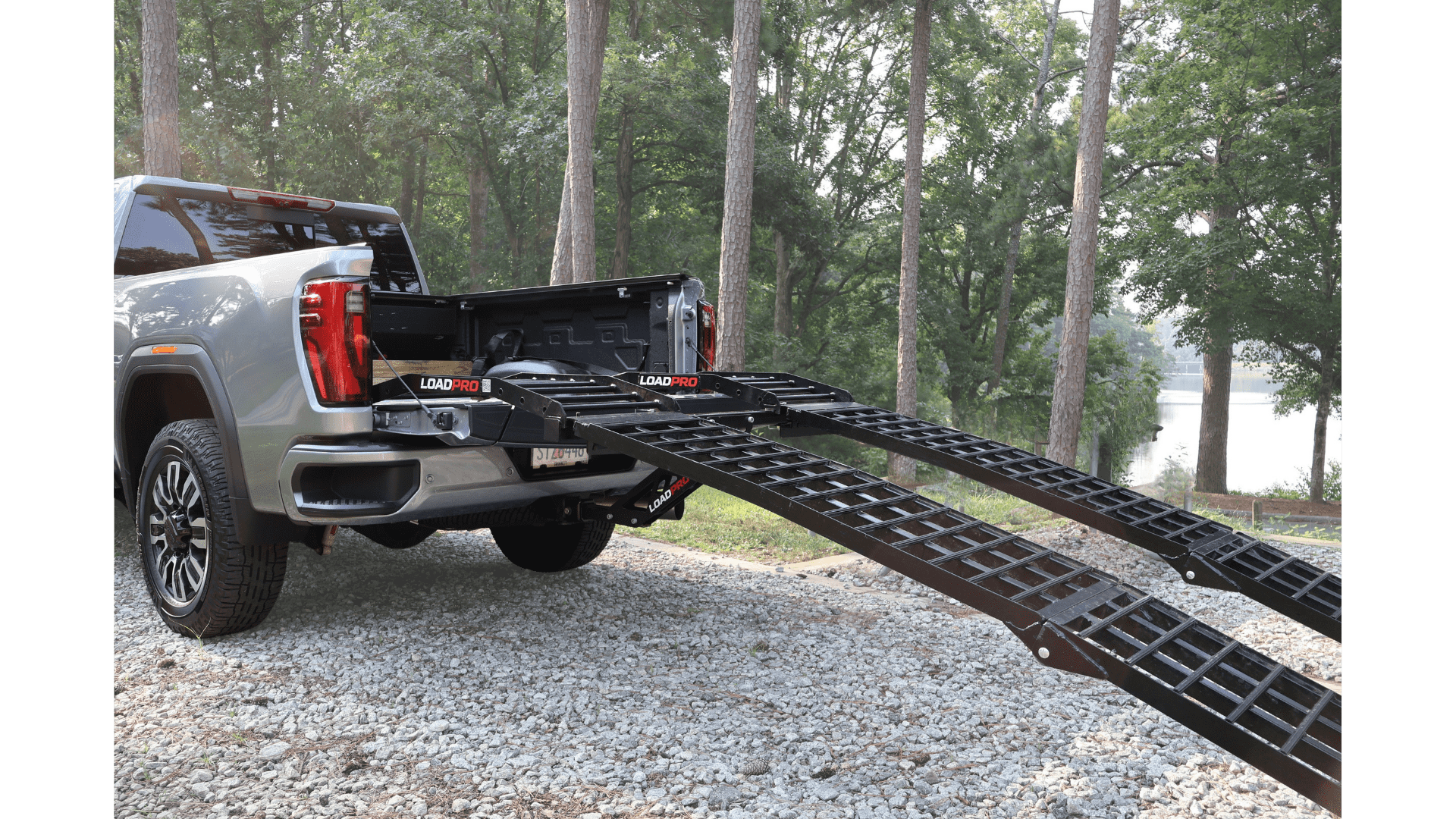 Load Pro ramps deployed on a pickup truck hitch ready for loading