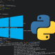 Windows and Python software logos over top of a computer screen with code