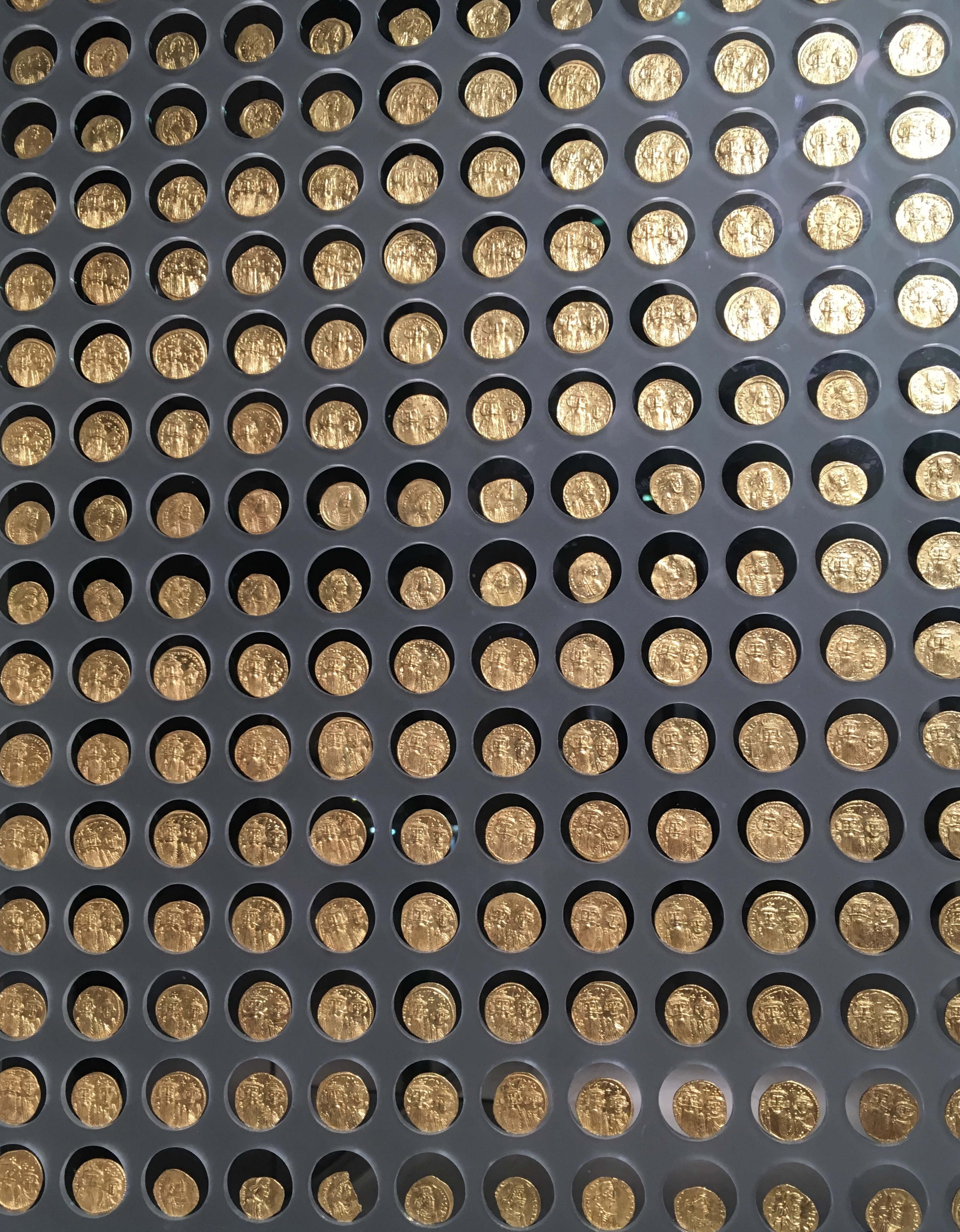 Athenian coins. The Spartans used long metal rods for currency as it was difficult to steal