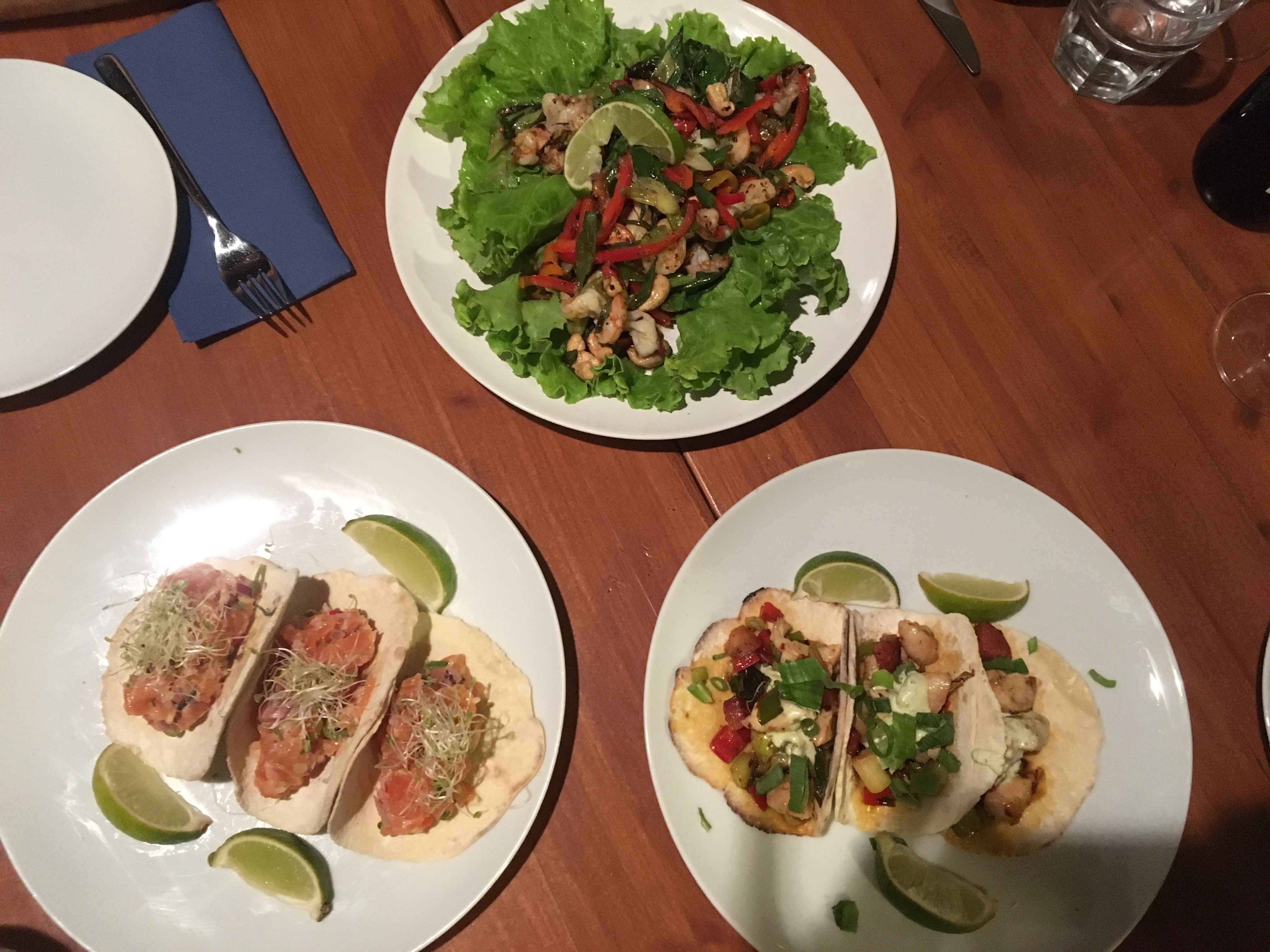 Salmon tacos, chorizo tacos and a chicken and cashew salad.