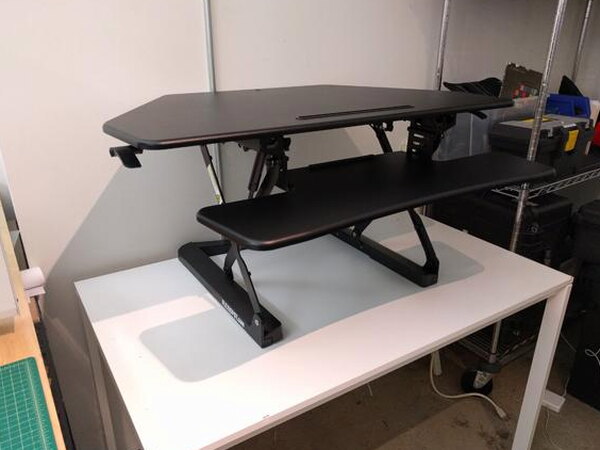 The FlexiSpot M4B desk fully assembled with the keyboard platform attached