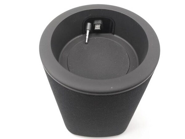 A top-down view into the Vaux cradle showing the internal micro-USB and headphone connectors