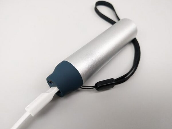 A close-up of the Lithium 3400 battery pack's aluminum shell and rubber tip