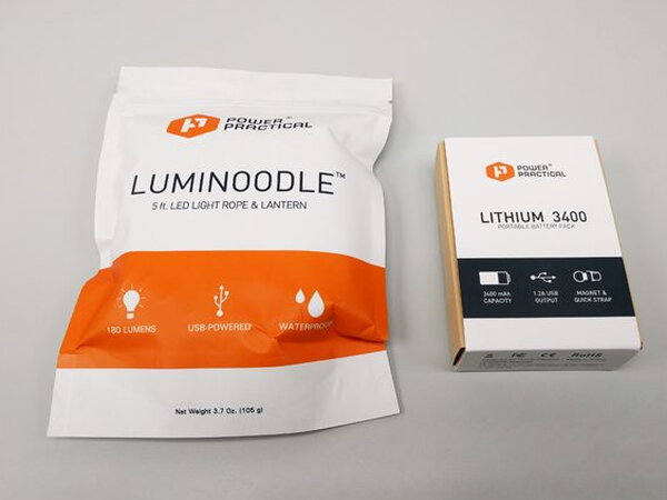 The Luminoodle foil packet next to the Lithium 3400 battery pack box