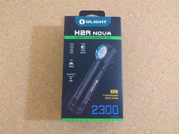 The Olight H2R Nova retail box with specs and lumen rating printed on the front