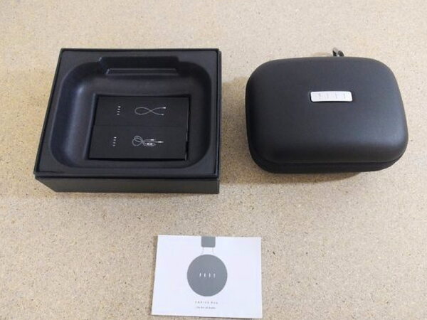 Everything included with the FIIL CANVIIS Pro: cable pouches, the case, and the manual