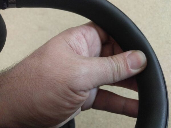 Pressing a thumb into the FIIL CANVIIS Pro headband padding to test its cushioning