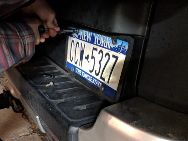 Vehicle license plate before installing LOOK-IT