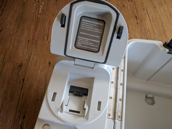 Battery dock in lid
