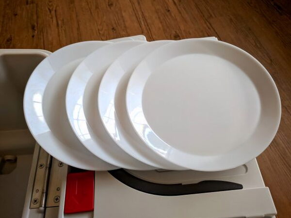 Four plastic plates