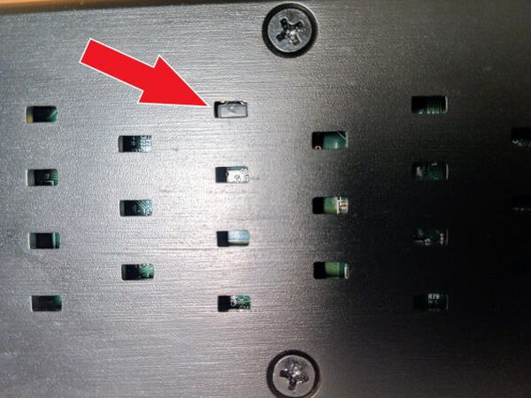 Hidden reset button inside a bottom vent on the Mohu AirWave Power Bridge