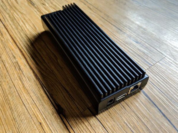 Black finned Mohu AirWave Power Bridge with visible ports