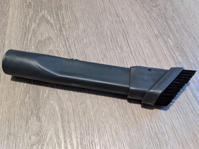 The narrow brush attachment can be used for small areas and edges.