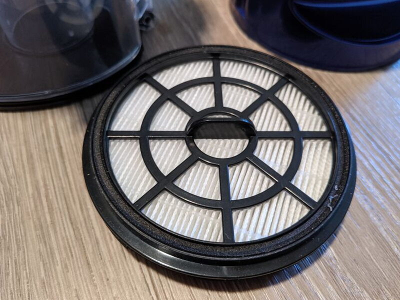The round washable filter pieces after removal from the container.