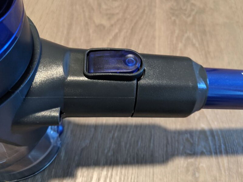 A blue release button on the connector keeps the tube locked in place.