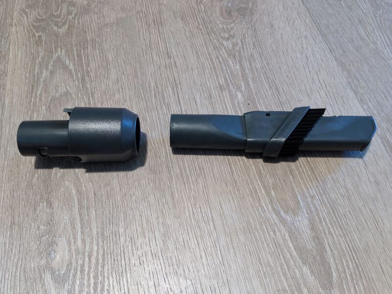 The separate connector and brush pieces used for different cleaning setups.