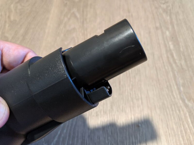 The powered connector on the floor brush supplies electricity to the roller head.