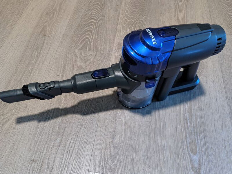The handheld unit with the 2-in-1 tool attached for smaller cleaning tasks.