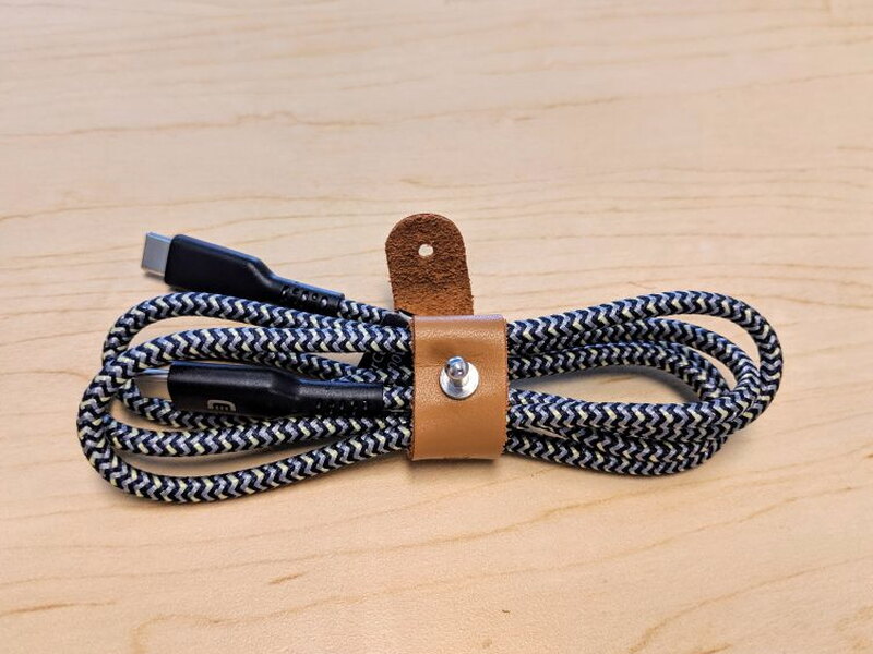 The SuperCord stores neatly with the attached brown leather strap.