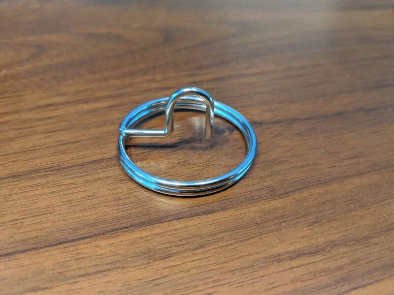 The included ring hook used to join multiple pulleys.