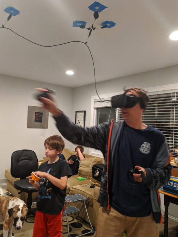 The senior tester using the V2 system during Job Simulator.