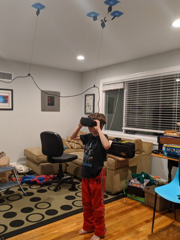 The shortest tester moving freely under the V2 cable setup.
