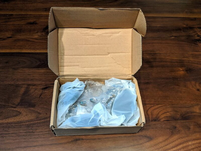 The V2 kit opened with the parts packed in small bags.