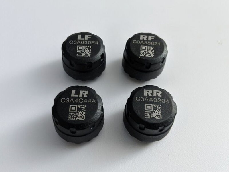 Each tire sensor is marked for a specific wheel position: LF, RF, LR, and RR.