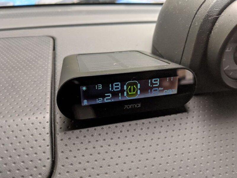 The receiver powers on from the dashboard and begins showing tire data.