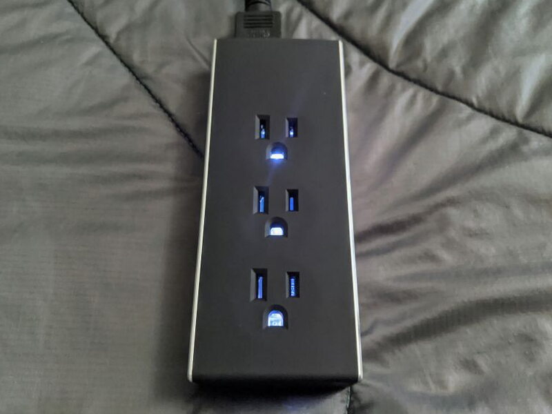 Blue lighting makes the outlet openings easier to find in darker rooms.