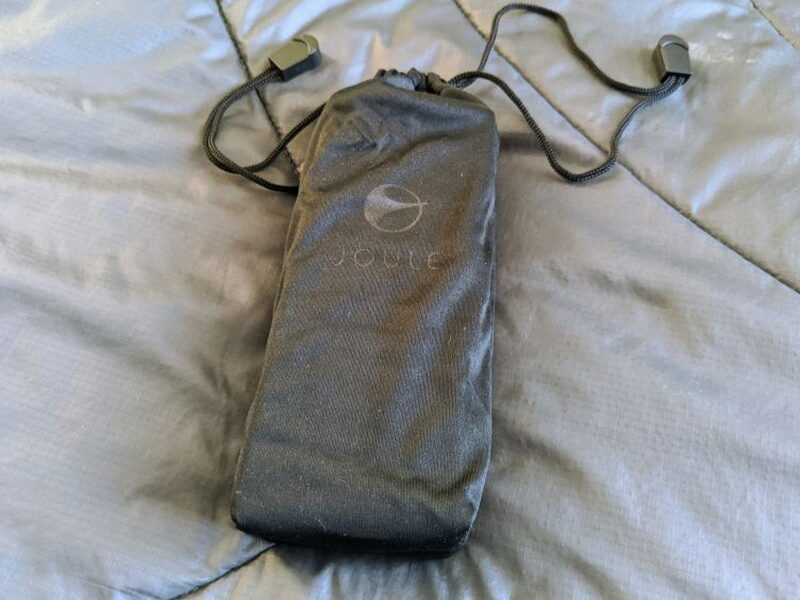 The pouch closes around the JouleBAR, but the power cord has to travel separately.
