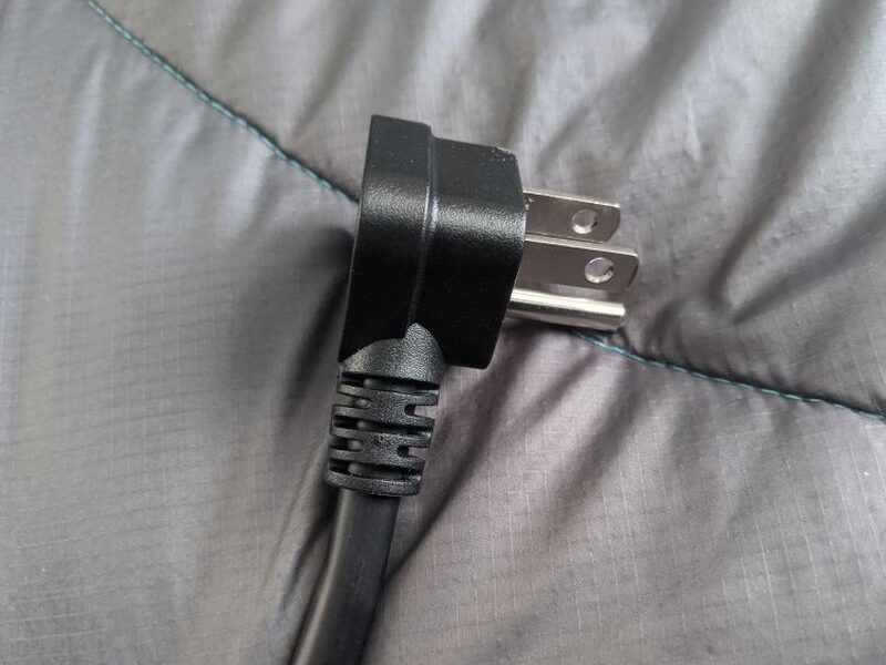 The included cable uses a low profile 90 degree wall plug.