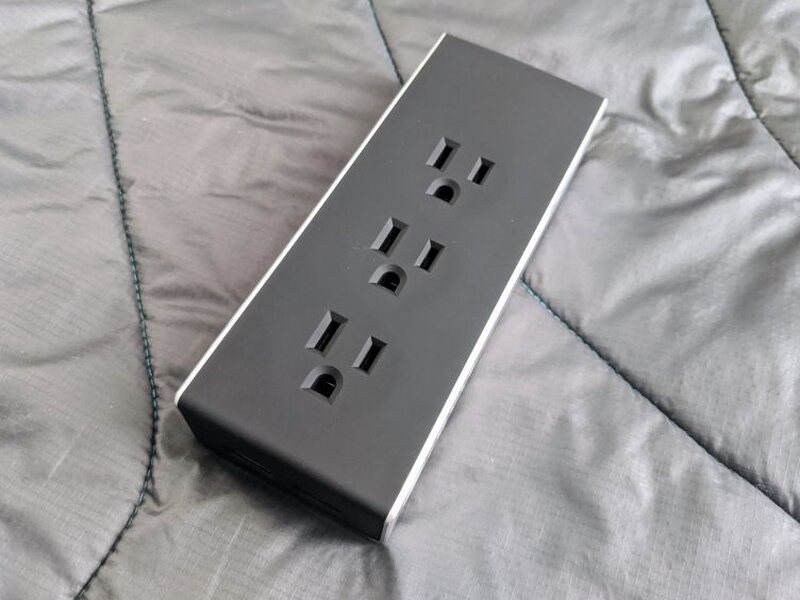 The top panel uses a matte insert surrounded by the aluminum body.