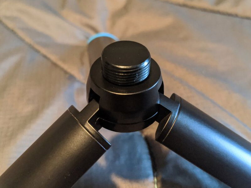 The tripod’s 5/8-inch threaded mount, where the swivel stand screws in.