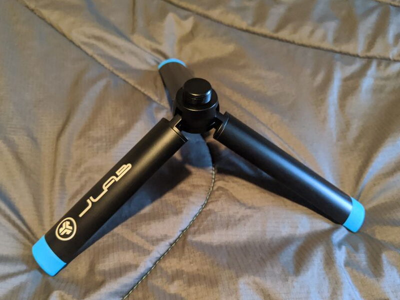 The tripod fully unfolded, legs spread and ready to stand on a desk.