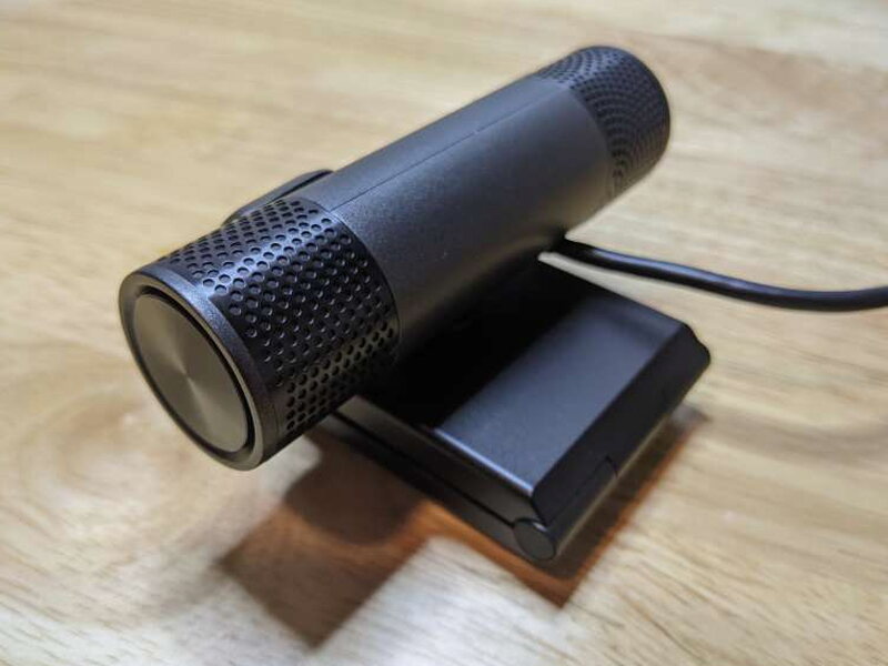 The fixed USB cable exits from the back of the webcam body.