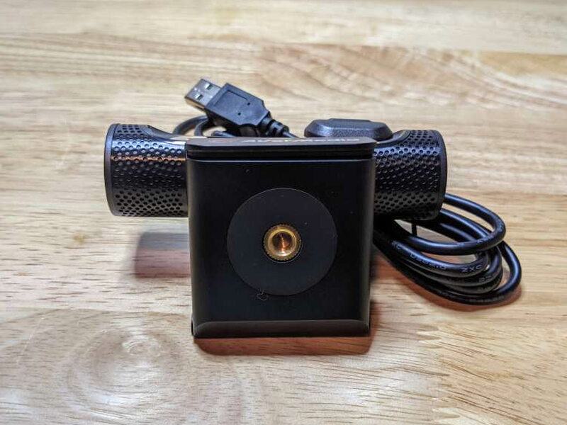 The bottom of the clip includes a standard tripod thread.