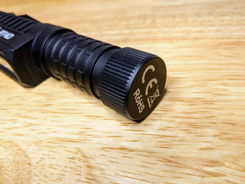 The tail cap magnet is visible on the bottom of the flashlight.