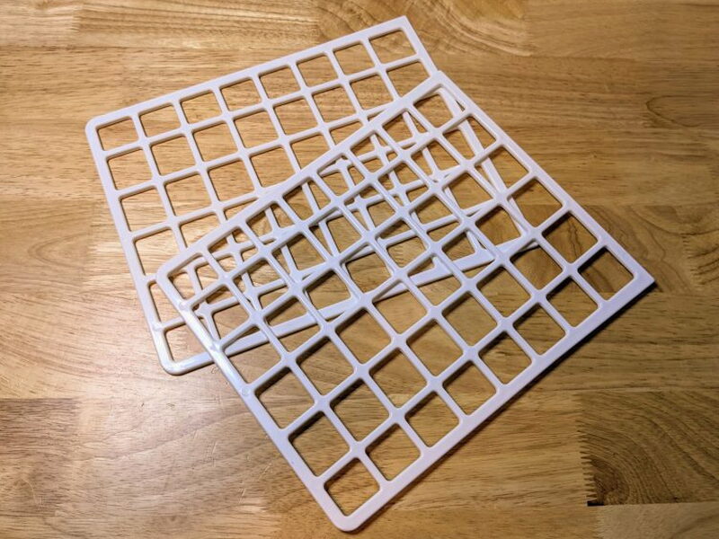 White divider panels used to separate contents inside the cooler.