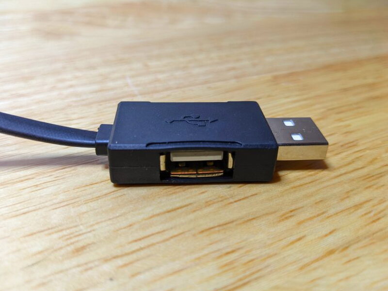 The USB-A connector includes a pass through USB-A port on the side.