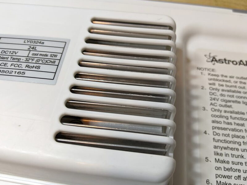 Interior vent beside the operating label and printed tips.