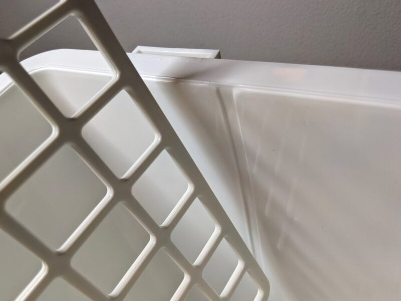 Divider panel sliding into an interior groove.