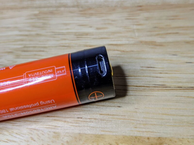 The battery has its Micro USB charging port built into the top of the cell.