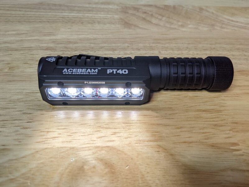 The PT40 resting on the table with the LEDs switched on.