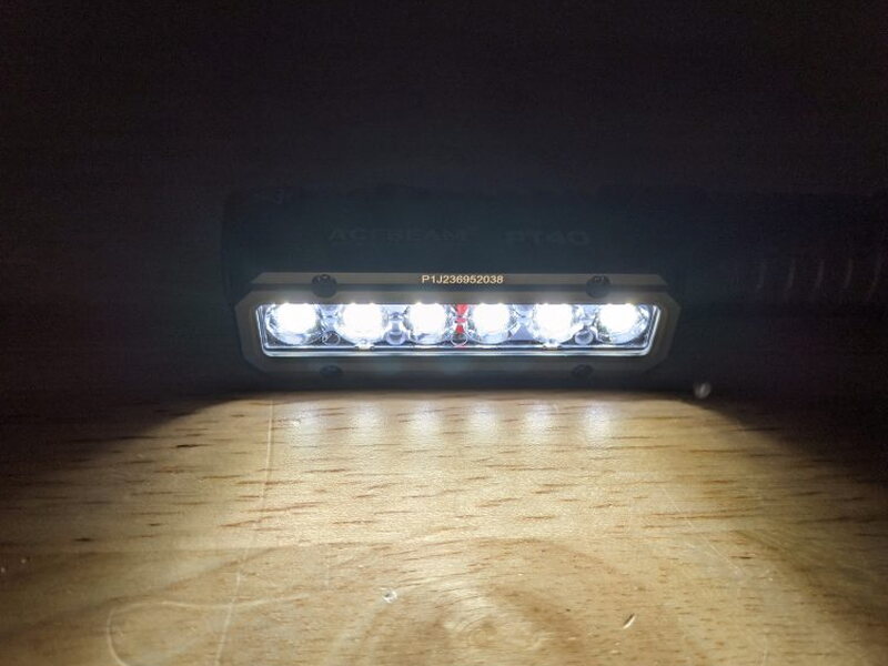 The six LEDs lit up at close range on the tabletop.