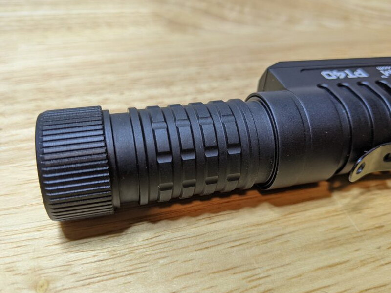 The knurled tail cap closes the battery compartment.