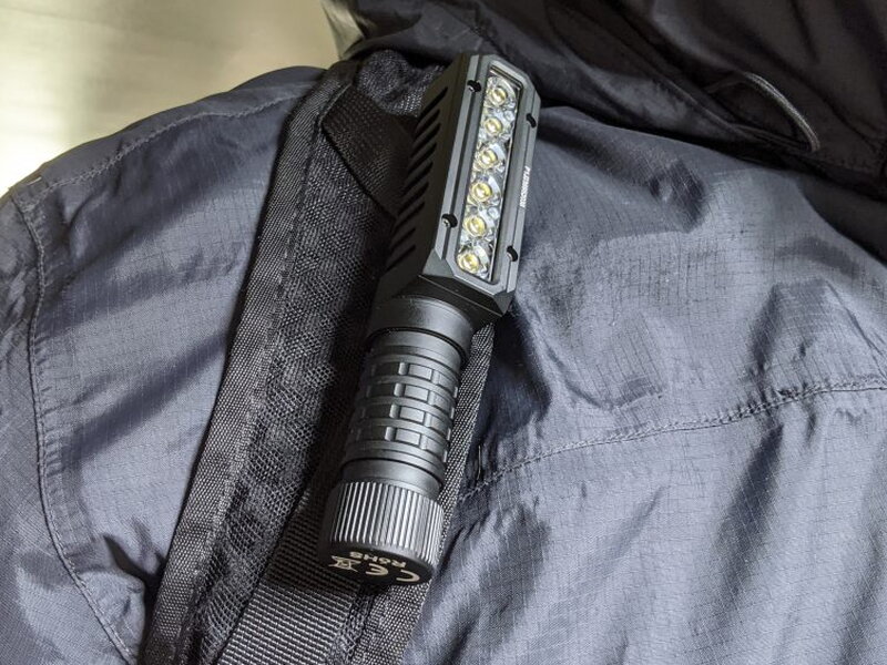 The PT40 clipped to a backpack strap for hands free lighting.