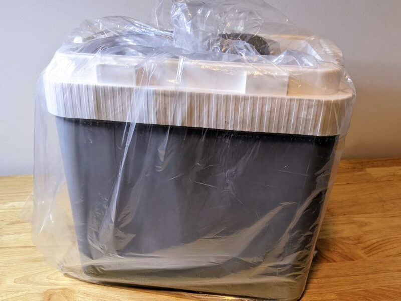 The cooler wrapped in plastic after coming out of the box.