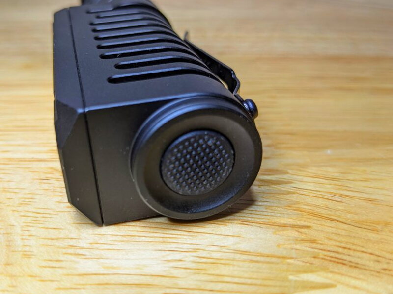 The rubberized power button sits on the end of the PT40 head.